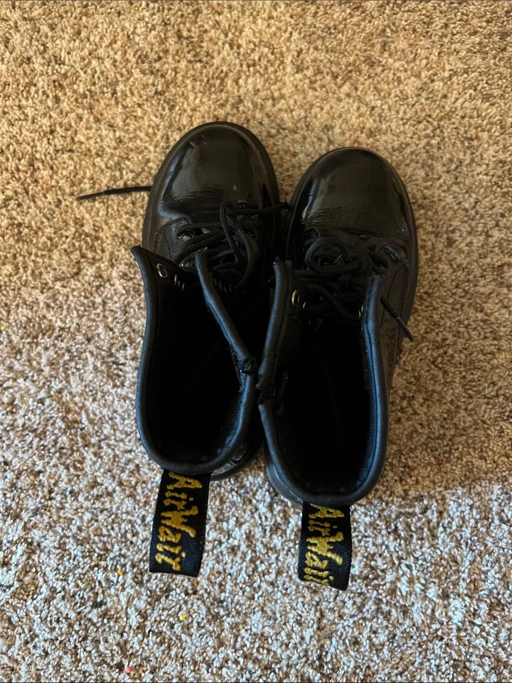Dr. Martens Black Patent 8-Eye Lace-Up Boots with Yellow Stitching